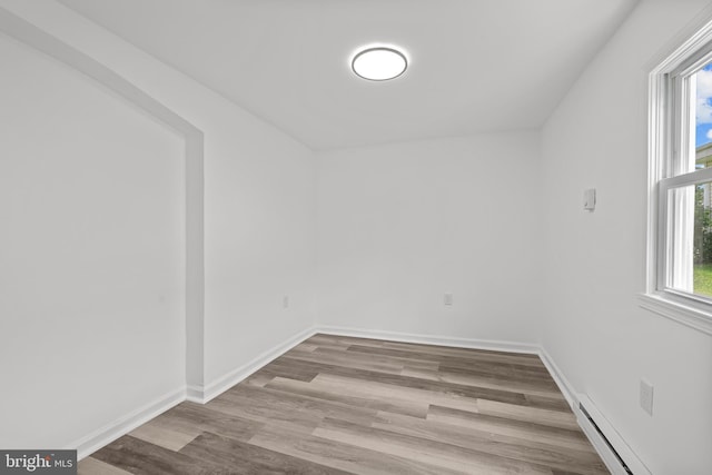 310 Elizabeth St, Middletown, DE 19709 - spare room with wood finished floors and baseboard heating
