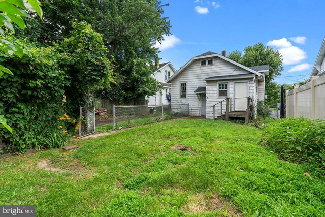 220 Homecrest Ave, Ewing, NJ 08638 - rear view of property with a chimney