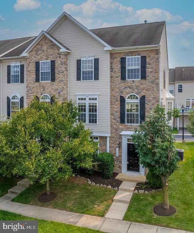 1750 Theale Way, Hanover, MD 21076 - multi unit property featuring stone siding and a front lawn