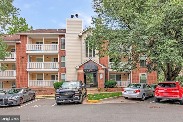1515 Lincoln Way Unit 304B, Mclean, VA 22102 - view of building exterior with uncovered parking