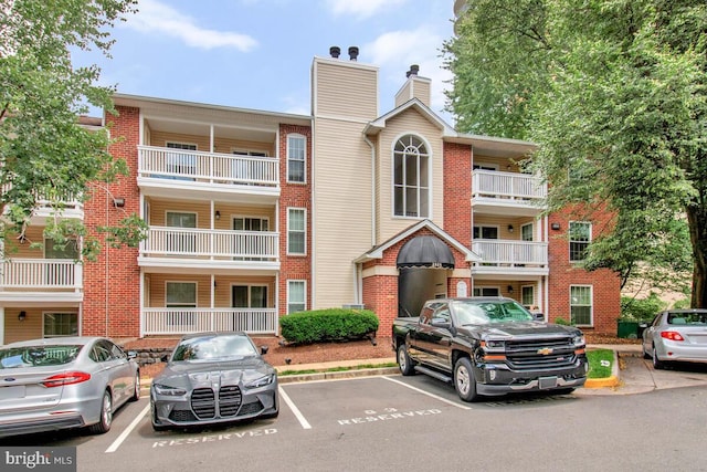 1515 Lincoln Way Unit 304B, Mclean, VA 22102 - view of building exterior featuring uncovered parking
