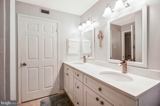 1515 Lincoln Way Unit 304B, Mclean, VA 22102 - bathroom featuring double vanity and tile patterned flooring