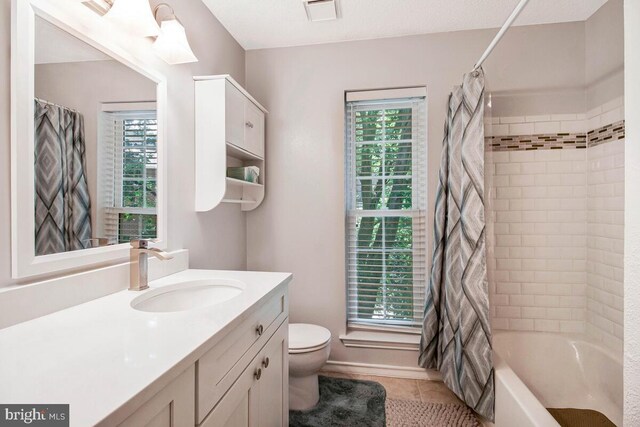 1515 Lincoln Way Unit 304B, Mclean, VA 22102 - full bath featuring vanity, plenty of natural light, shower / bath combo, and tile patterned flooring