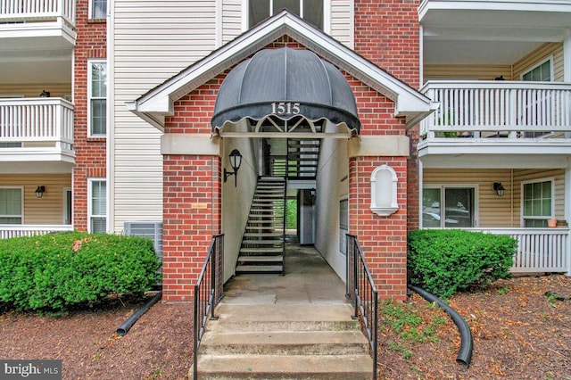 1515 Lincoln Way Unit 304B, Mclean, VA 22102 - view of exterior entry featuring brick siding