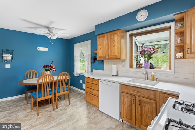 2028 S Olden Ave, Hamilton, NJ 08610 - kitchen featuring white appliances, tasteful backsplash, light countertops, a ceiling fan, and brown cabinets