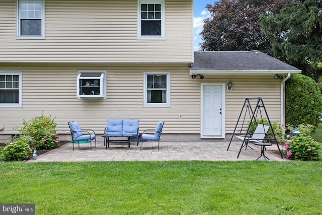 2028 S Olden Ave, Hamilton, NJ 08610 - rear view of property with a lawn, a patio area, an outdoor hangout area, and a shingled roof