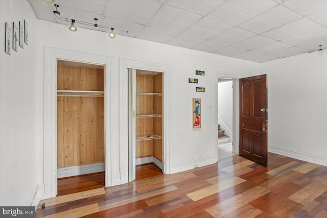 609 E Chestnut St, Lancaster, PA 17603 - unfurnished bedroom featuring wood finished floors and baseboards