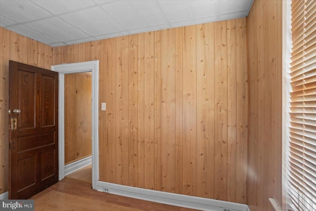 609 E Chestnut St, Lancaster, PA 17603 - spare room featuring wooden walls and wood finished floors