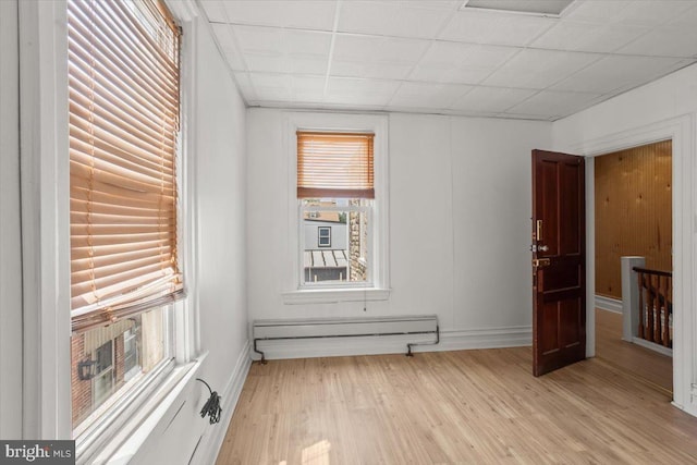 609 E Chestnut St, Lancaster, PA 17603 - empty room featuring baseboard heating and light wood-style flooring