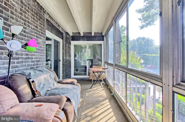 12 Stonehenge Cir Unit 12-5, Baltimore, MD 21208 - sunroom / solarium featuring healthy amount of natural light and beamed ceiling
