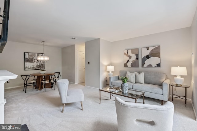 2810 Lee Oaks Pl Unit 302, Falls Church, VA 22046 - living area with light carpet and a chandelier