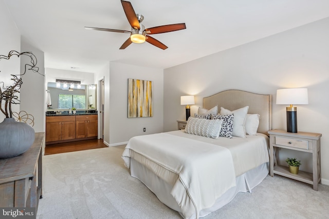 2810 Lee Oaks Pl Unit 302, Falls Church, VA 22046 - bedroom with light colored carpet, ensuite bath, and a ceiling fan