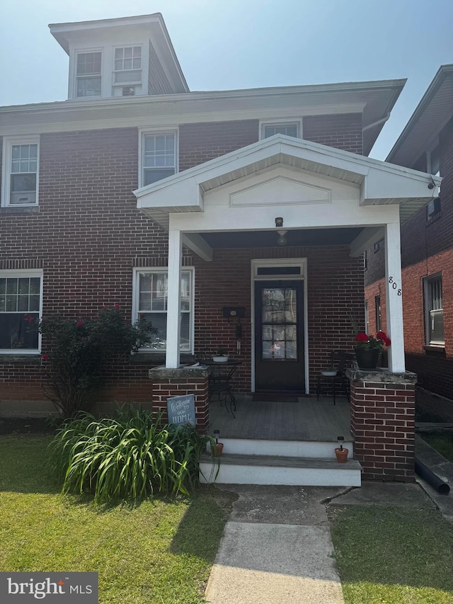 808 Mulberry Ave, Hagerstown, MD 21742 - entrance to property featuring covered porch and brick siding