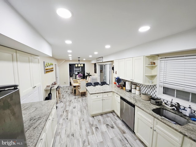 1 Helm Turn, Willingboro, NJ 08046 - kitchen featuring stainless steel dishwasher, white cabinets, open shelves, light wood finished floors, and backsplash