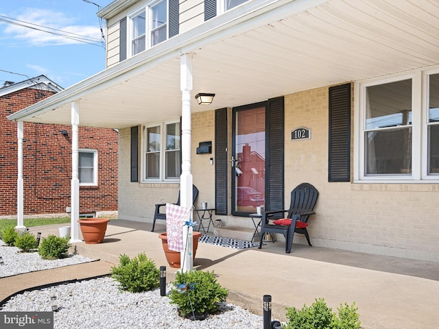 102 W Keystone Ave, Wilmington, DE 19804 - entrance to property featuring brick siding and a porch