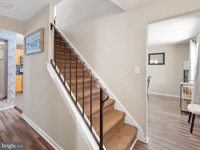 102 W Keystone Ave, Wilmington, DE 19804 - stairs featuring wood finished floors and baseboards