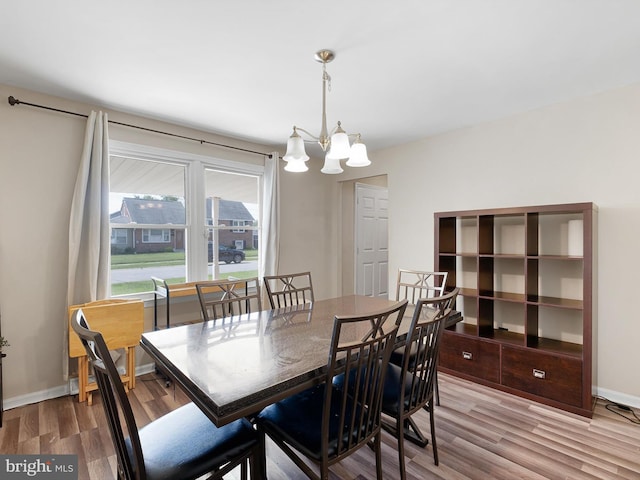 102 W Keystone Ave, Wilmington, DE 19804 - dining room with a chandelier and wood finished floors