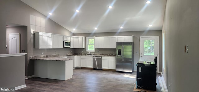LOT664 Old Oak Ln, Front Royal, VA 22630 - kitchen featuring stainless steel appliances, lofted ceiling, dark wood-type flooring, white cabinetry, and light stone counters