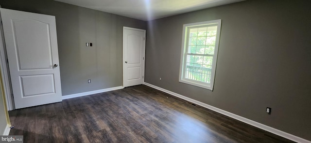 LOT664 Old Oak Ln, Front Royal, VA 22630 - unfurnished bedroom featuring dark wood-type flooring and baseboards