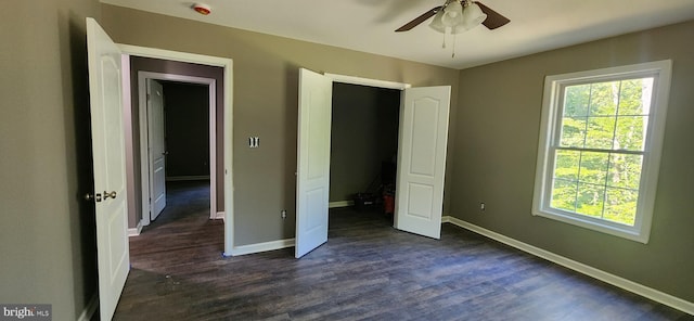 LOT664 Old Oak Ln, Front Royal, VA 22630 - unfurnished bedroom with multiple windows, dark wood finished floors, and a ceiling fan