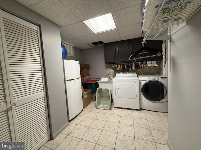 2737 Willits Rd, Philadelphia, PA 19114 - laundry room featuring cabinet space, independent washer and dryer, and light tile patterned floors