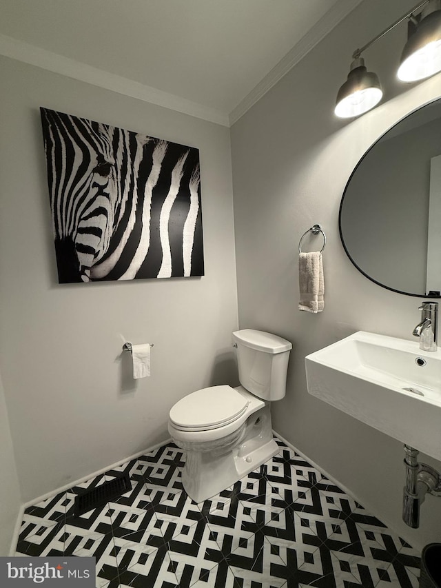 2737 Willits Rd, Philadelphia, PA 19114 - half bathroom with toilet and ornamental molding