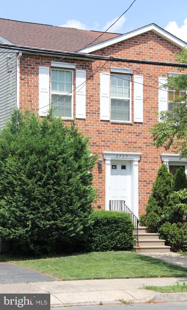 2737 Willits Rd, Philadelphia, PA 19114 - view of front facade featuring brick siding and a shingled roof