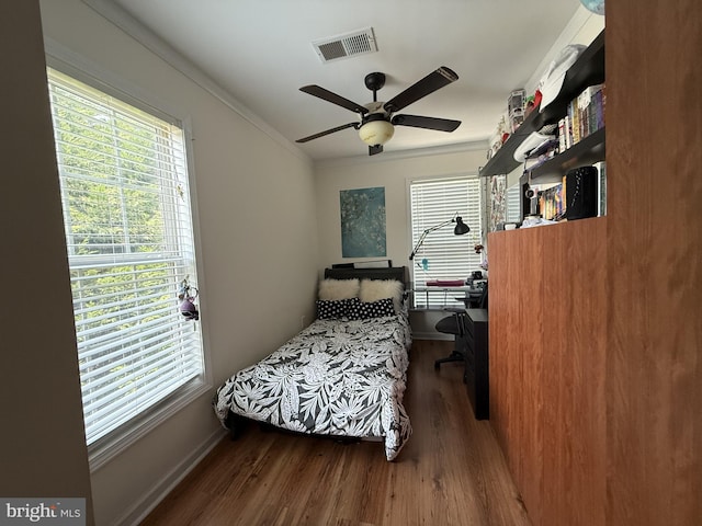 2737 Willits Rd, Philadelphia, PA 19114 - bedroom featuring wood finished floors, multiple windows, ornamental molding, and a ceiling fan