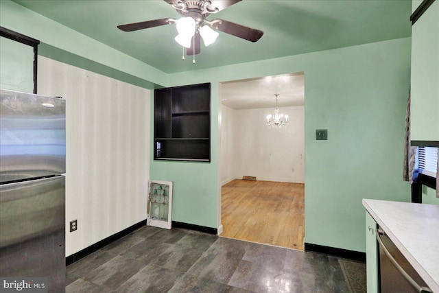 3225 Eisenbrown Rd, Reading, PA 19605 - kitchen with appliances with stainless steel finishes, ceiling fan, a chandelier, dark wood-type flooring, and light countertops