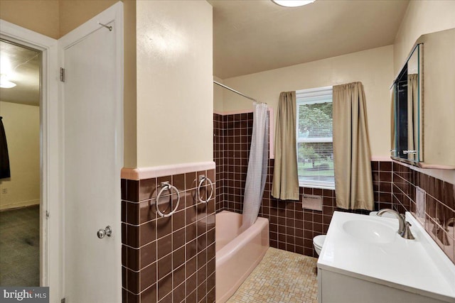 3225 Eisenbrown Rd, Reading, PA 19605 - bathroom featuring tile walls, vanity, shower / bath combination with curtain, and a wainscoted wall