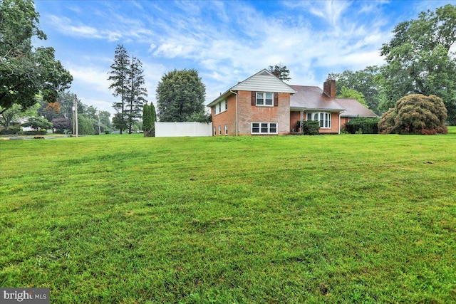 3225 Eisenbrown Rd, Reading, PA 19605 - rear view of house featuring a chimney and brick siding