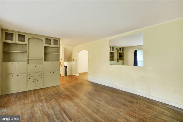 3225 Eisenbrown Rd, Reading, PA 19605 - unfurnished living room featuring wood finished floors and arched walkways