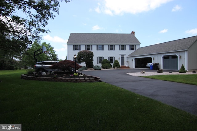 530 Station Rd, Quakertown, PA 18951 - colonial home with driveway, a front yard, and a garage