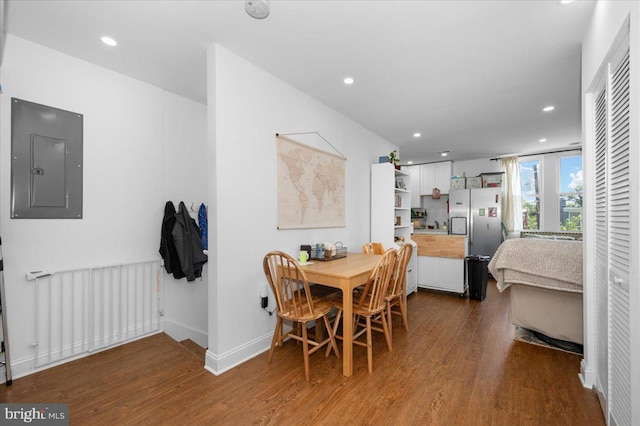 211 Webster St NE, Washington, DC 20011 - dining room with electric panel, wood finished floors, and recessed lighting