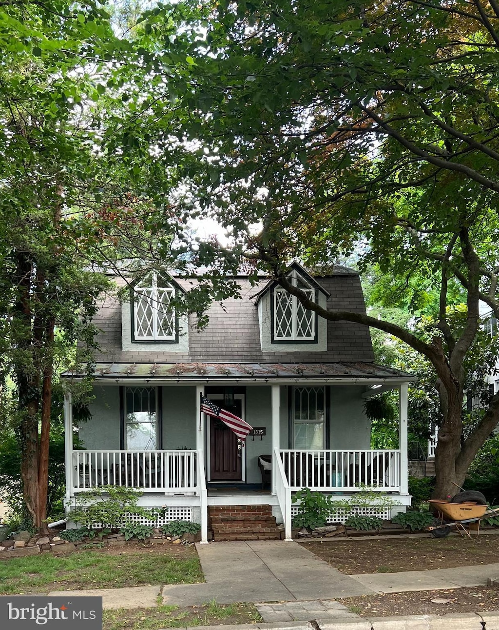 1315 Dauphin Ave, Wyomissing, PA 19610 - view of front of property featuring covered porch, stucco siding, and roof with shingles