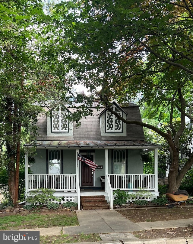 1315 Dauphin Ave, Wyomissing, PA 19610 - view of front of property featuring covered porch, stucco siding, and roof with shingles