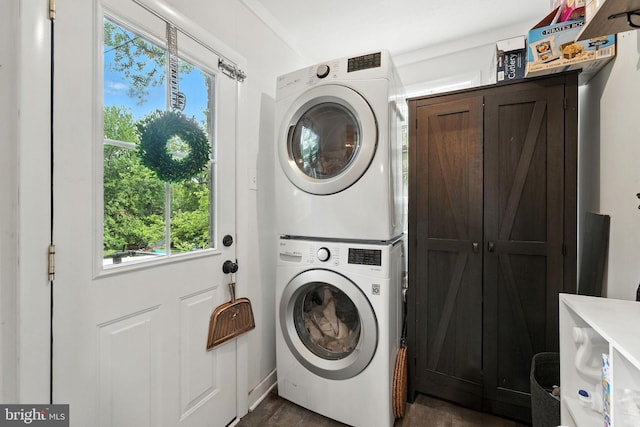 1900 Philadelphia Pike, Claymont, DE 19703 - washroom with stacked washing machine and dryer and cabinet space
