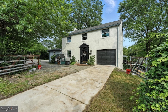 1900 Philadelphia Pike, Claymont, DE 19703 - traditional-style home with concrete driveway, a garage, and brick siding
