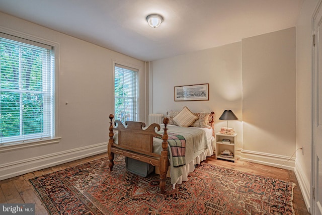 407 N 8th St, Allentown, PA 18102 - bedroom featuring wood finished floors and baseboards