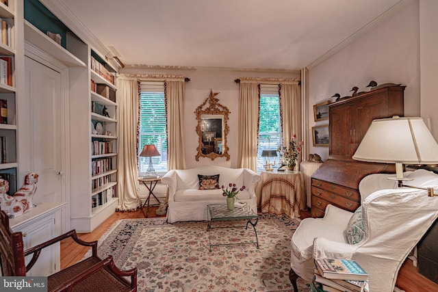 407 N 8th St, Allentown, PA 18102 - living area with healthy amount of natural light, ornamental molding, and wood finished floors