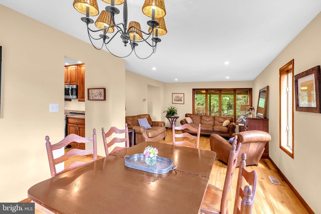210 Providence Rd, Annapolis, MD 21409 - dining room featuring light wood-style floors, a chandelier, and recessed lighting