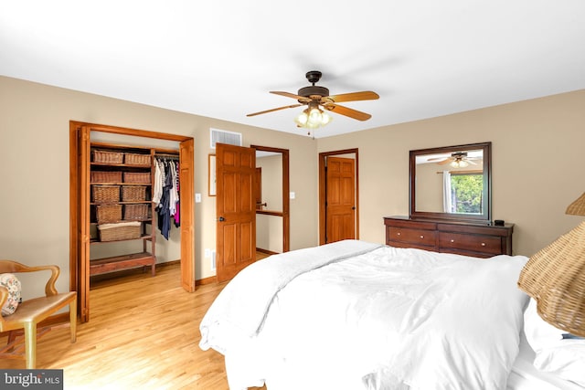 210 Providence Rd, Annapolis, MD 21409 - bedroom with light wood finished floors, a closet, ceiling fan, and a spacious closet