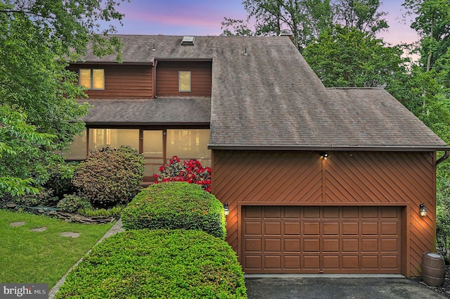 210 Providence Rd, Annapolis, MD 21409 - view of front of house featuring a shingled roof and a garage