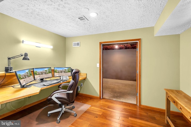 210 Providence Rd, Annapolis, MD 21409 - office area with hardwood / wood-style flooring and a textured ceiling