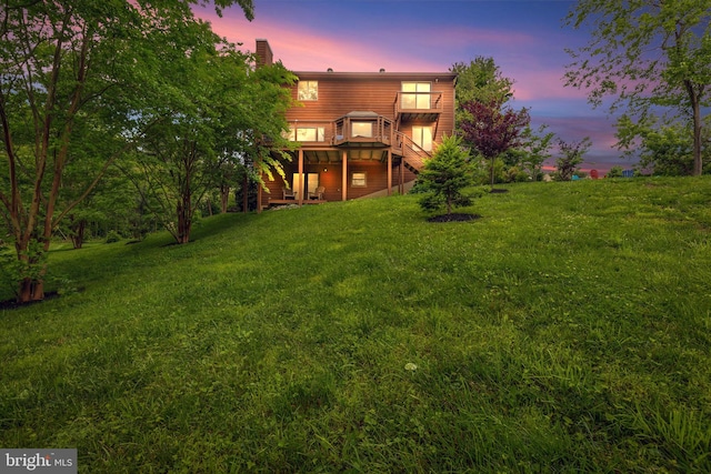 210 Providence Rd, Annapolis, MD 21409 - view of grassy yard with stairway and a wooden deck