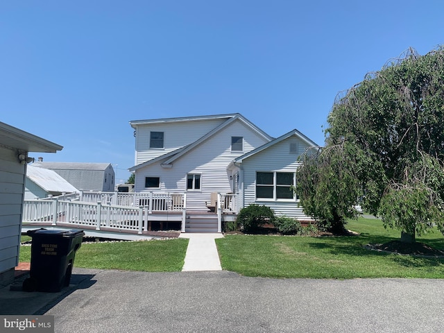 21055 Bayside Ave, Rock Hall, MD 21661 - view of front of home featuring a deck and a front lawn