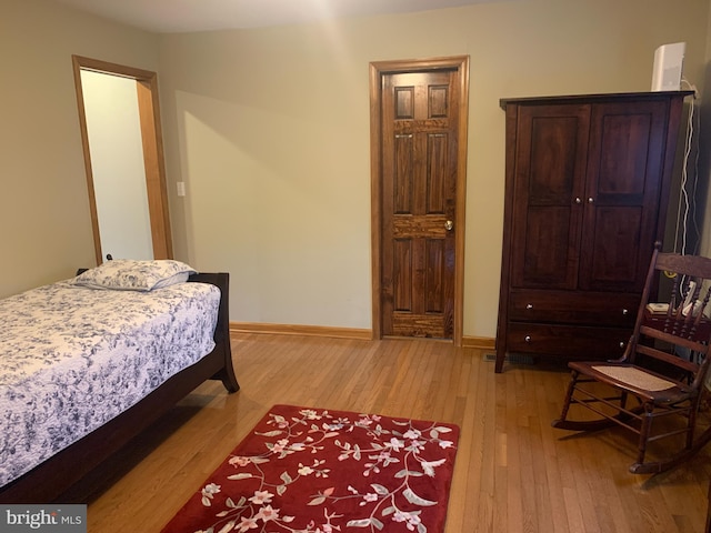 21055 Bayside Ave, Rock Hall, MD 21661 - bedroom featuring light wood-style flooring and baseboards
