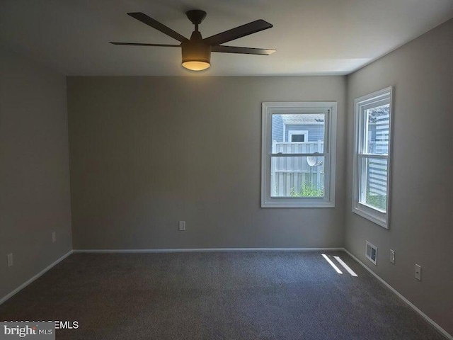 57 Turnberry Cir, Toms River, NJ 08753 - unfurnished room with dark colored carpet and ceiling fan