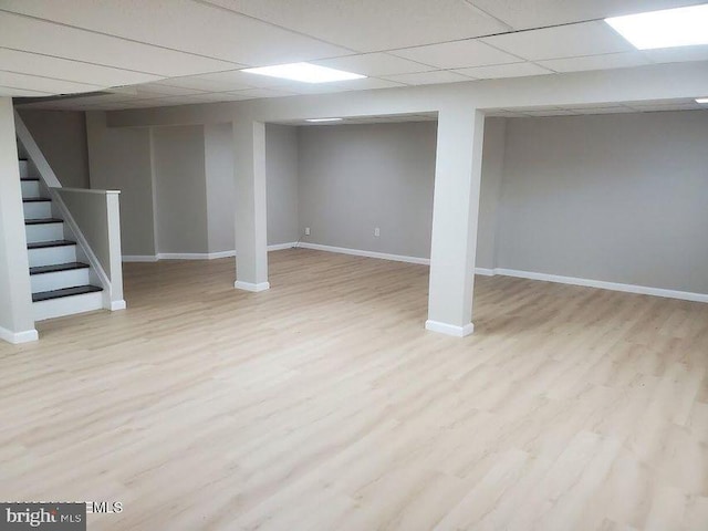 57 Turnberry Cir, Toms River, NJ 08753 - finished basement with a paneled ceiling, stairs, and wood finished floors