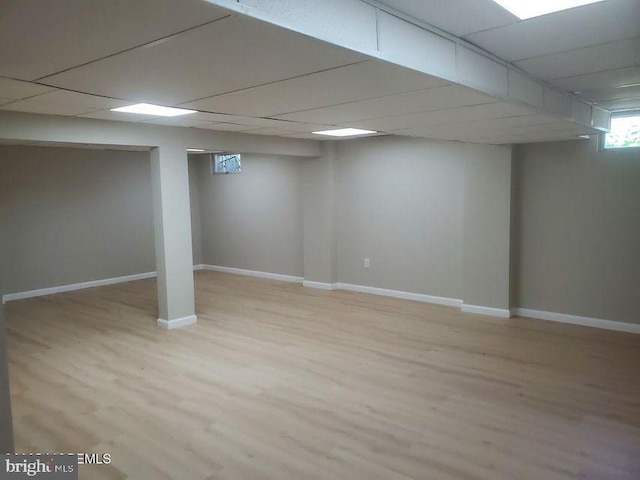 57 Turnberry Cir, Toms River, NJ 08753 - basement with light wood-style floors and a paneled ceiling